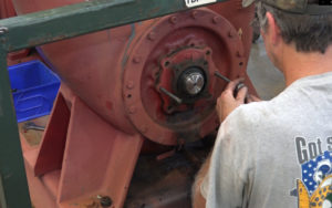 Man fixing Pump Wet Ends