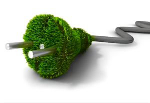 Close-up of a bright green moss-covered globe intertwined with a gray flexible tube on a white background. 