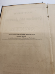 Faded, upside-down title page from an 1880 book, showing 'Entered according to Act of Congress... Stephen Roper'