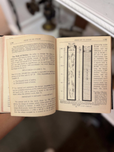 Open vintage science book with dense text on the left and a vertical bar chart on the right labeled From Ice to Steam.